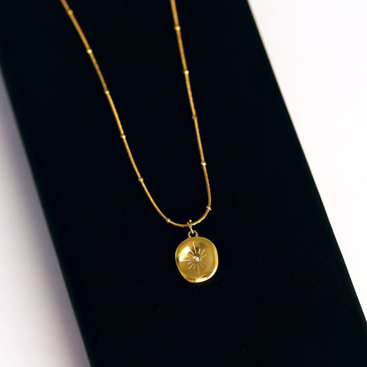 Golden Oval Pendant Necklace